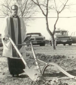 Our founding pastor breaking ground with a plow
